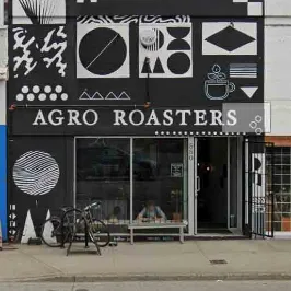 black and white storefront with geometric patterns and "agro roasters" signage displayed., agro coffee roasters, vancouver