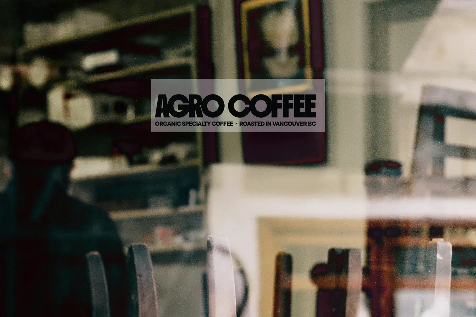 agro coffee specialty roastery storefront with blurred interior details and signage., agro coffee roasters, vancouver