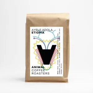 kraft paper coffee bag labeled "aysle adola ethiopia" with animal coffee roasters branding., animal coffee roasters - café de