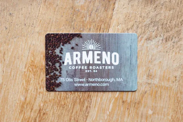 armeno coffee roasters business card on wooden surface with coffee beans., armeno coffee roasters, northborough
