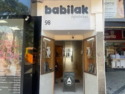 babilak optician storefront with number 98, entrance displaying eyewear products., aussie coffee (hidden down a long corridor