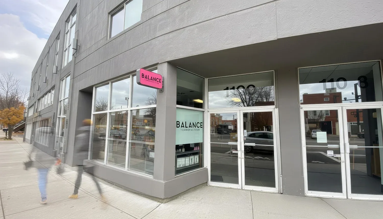 balance salon storefront with pink signage on modern gray building exterior., balance torrefacteur, verdun