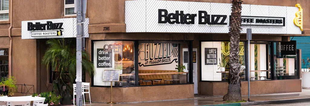 better buzz coffee roasters storefront with palm trees and modern signage., better buzz coffee mission beach, san diego