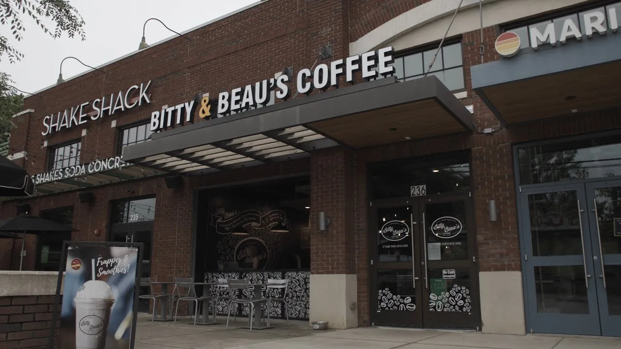 brick storefront with shake shack and bitty & beau's coffee signage displayed prominently., bitty & beau's coffee, charlotte