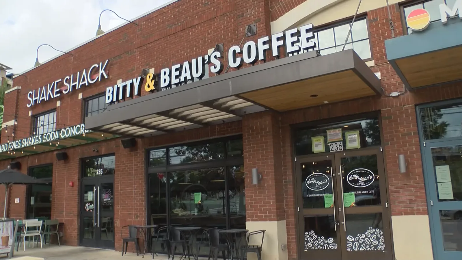 brick storefront with "shake shack" and "bitty & beau's coffee" signage visible., bitty & beau's coffee, charlotte