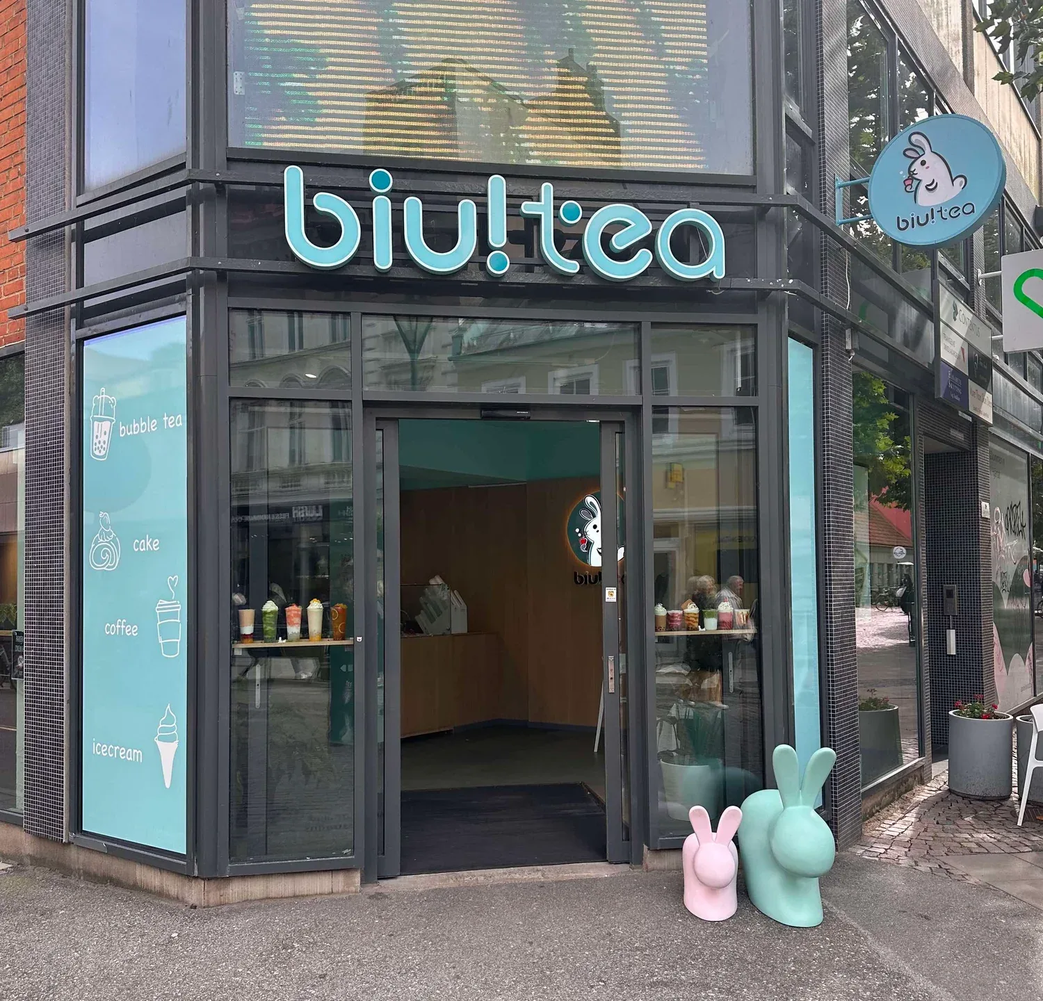 biultea bubble tea shop storefront with turquoise signage and cute bunny decorations outside., biu!tea malmö, malmö