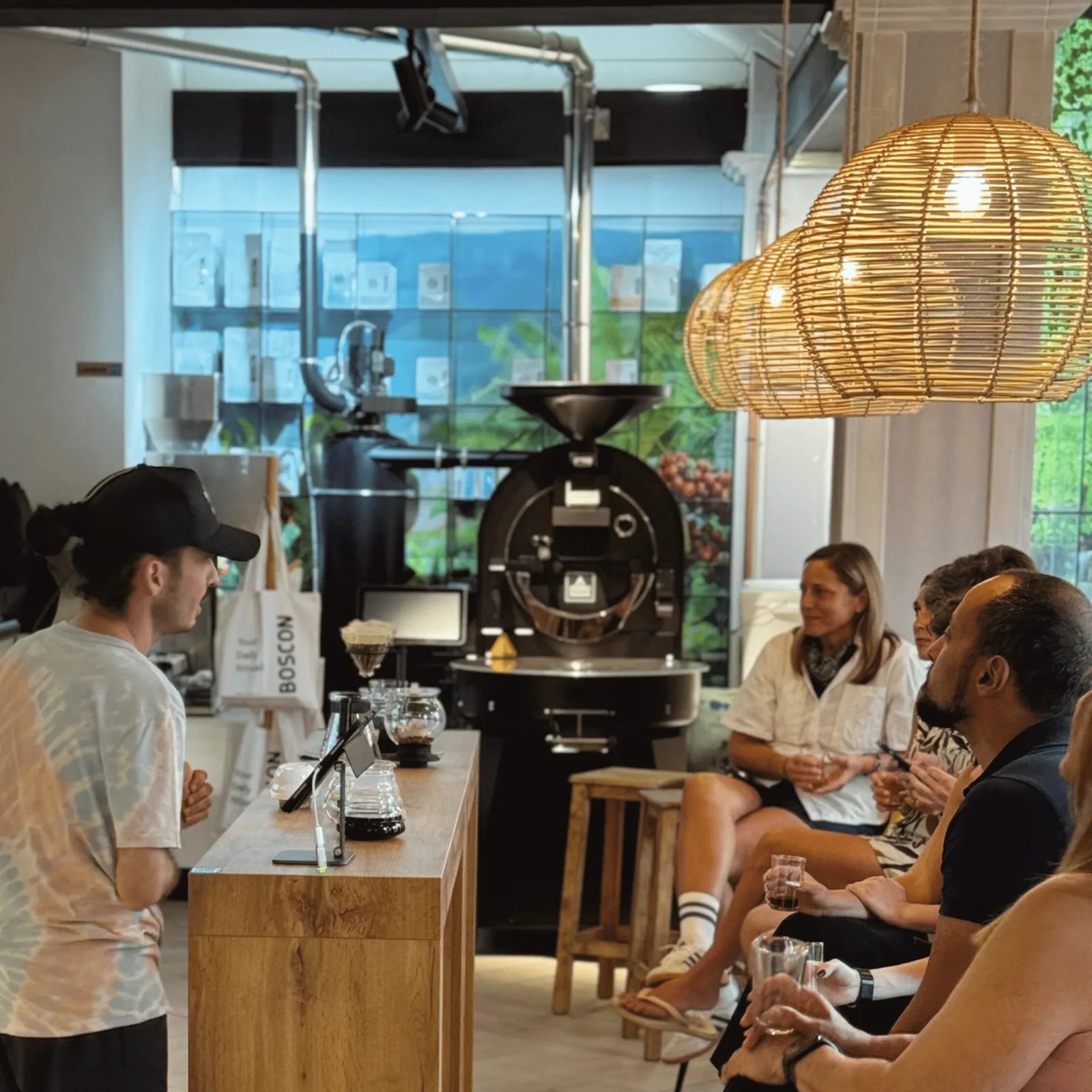 coffee roastery tasting event with instructor and seated guests learning., boscon | specialty coffee roasters & brunch, valèn