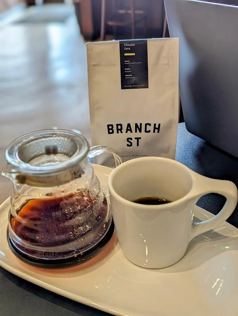 branch st coffee setup with ethiopia gera beans, carafe, and white cup., branch street coffee roasters, ohio