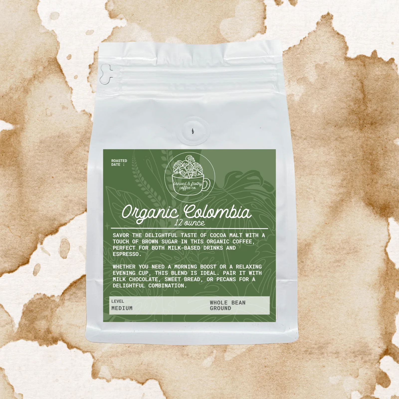 white coffee bag with green label on textured beige and white background., brewed & frothy coffee co., independence