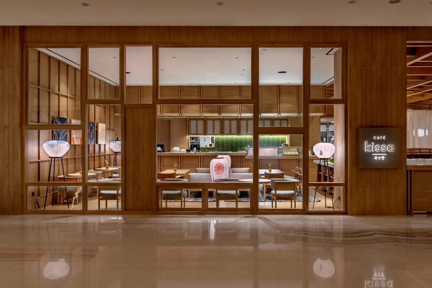 modern café storefront with wooden lattice design and glowing neon signage., cafe kissa - grand indonesia, jakarta