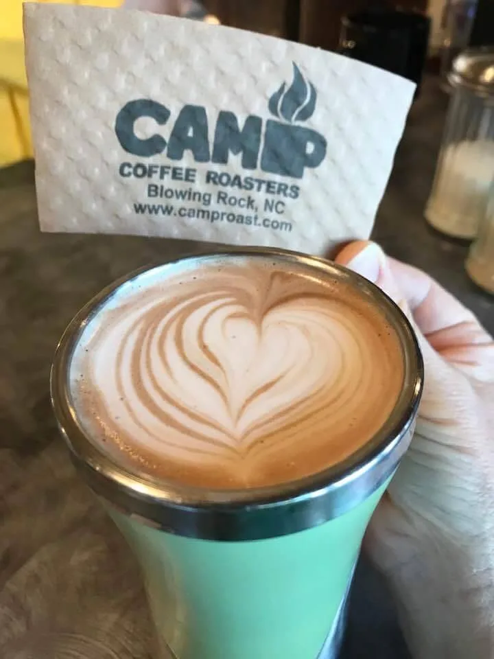 latte with heart latte art from camp coffee roasters in blowing rock., camp coffee roasters, blowing rock