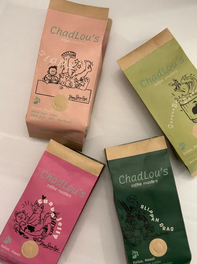 four colorful chadlou's coffee roaster bags displayed on white surface., chad lou's coffee, kailua