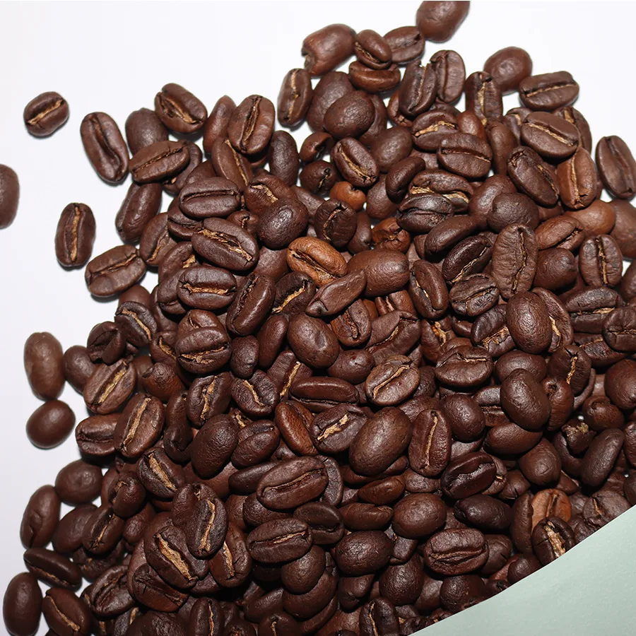 roasted coffee beans scattered on white and light green background., ciscos coffee, windsor