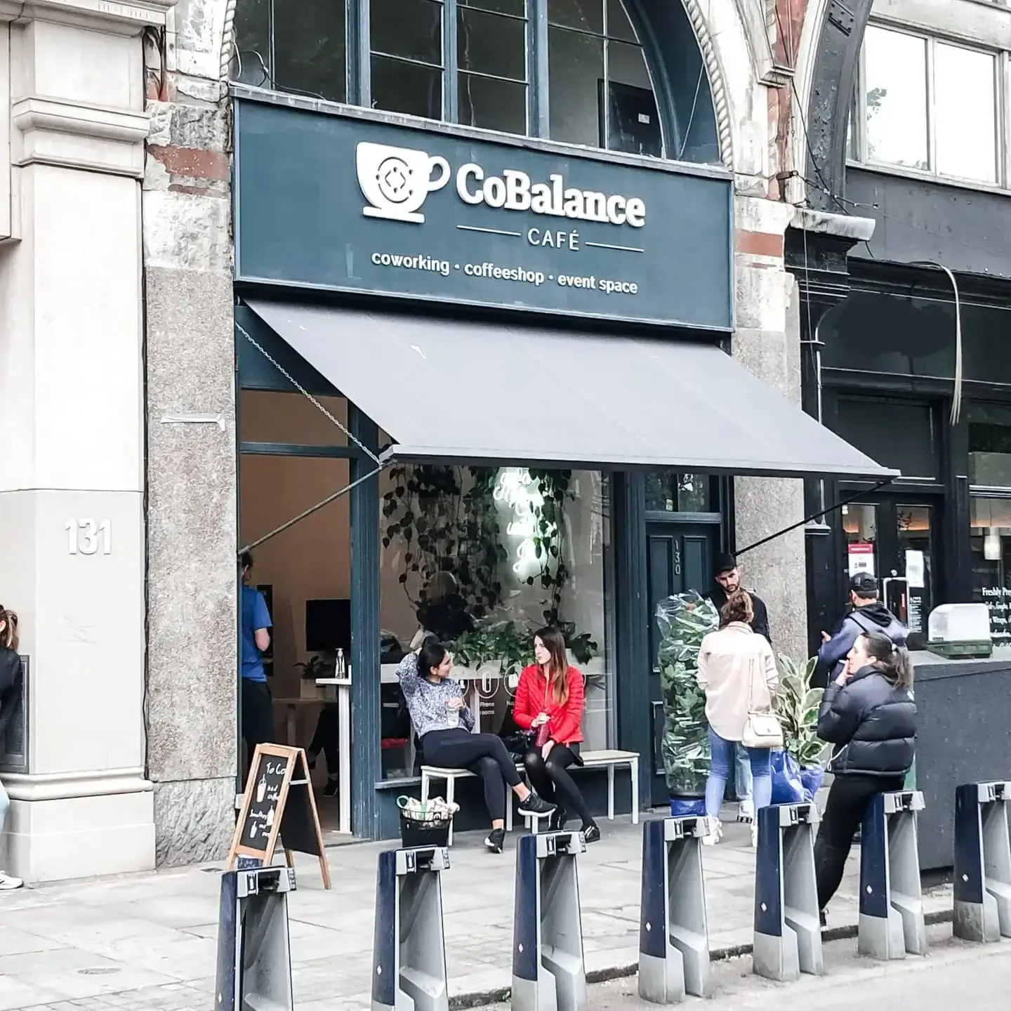 cobalance café storefront with coworking space, customers seated inside and outside., cobalance, london