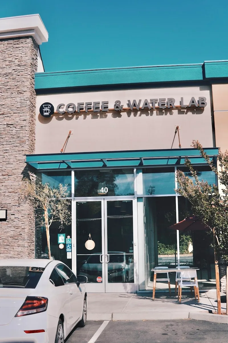 coffee & water lab storefront with turquoise awning and modern minimalist design., coffee & water lab, san jose