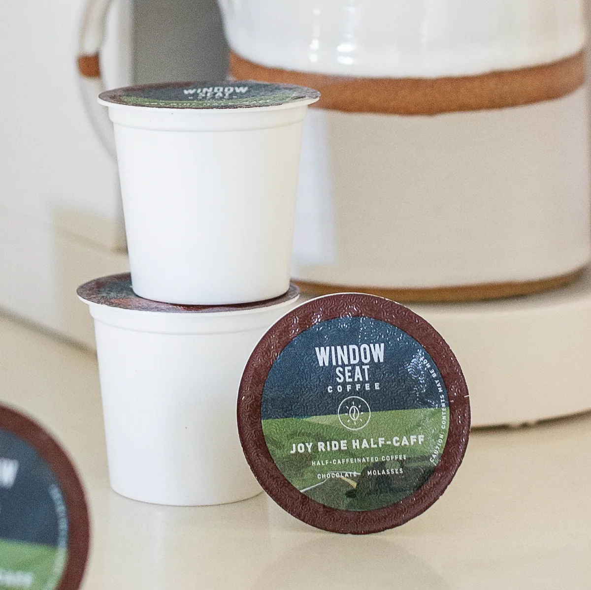 joy ride half-caff single serve pods coffee by window seat coffee