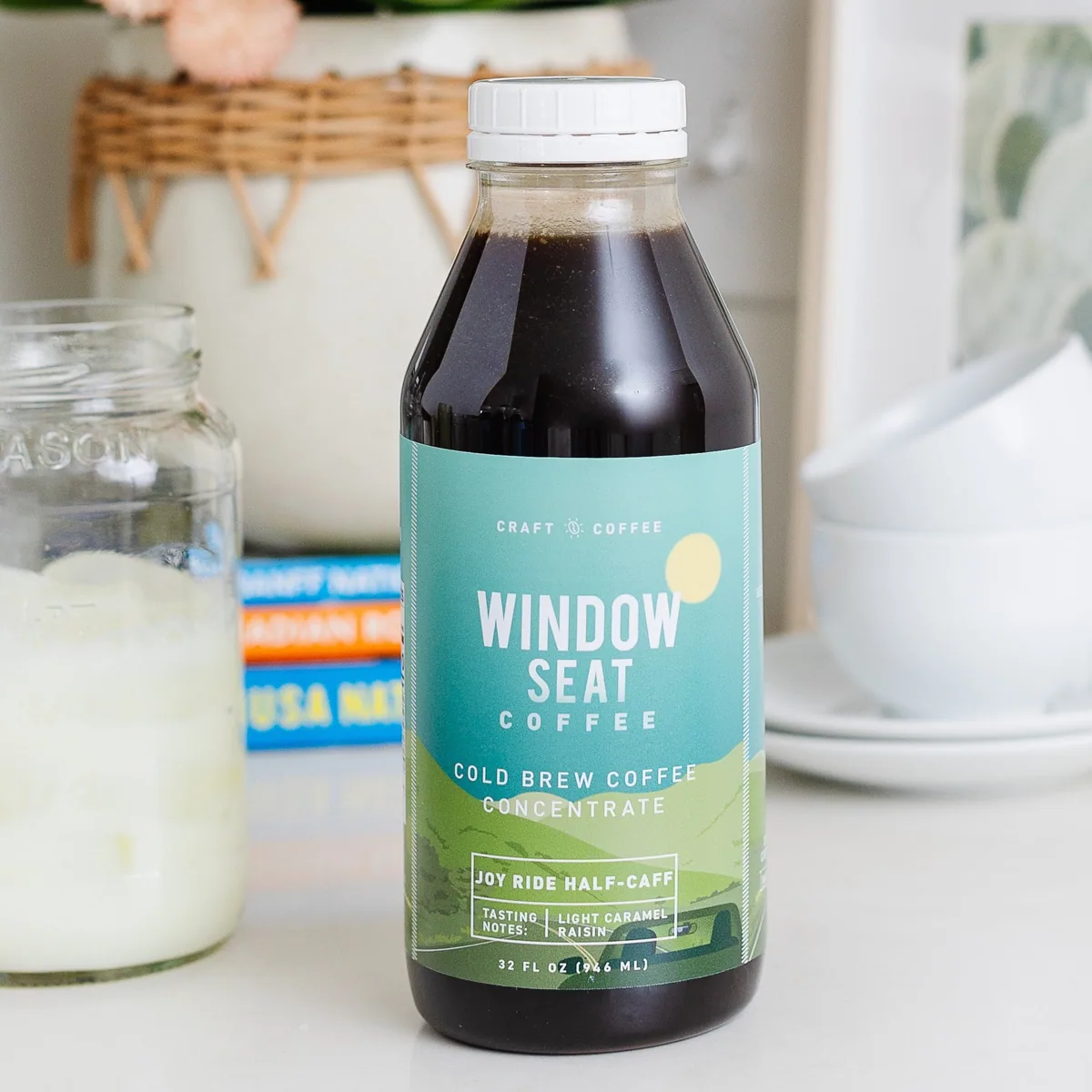 joy ride half-caff cold brew concentrate coffee by window seat coffee