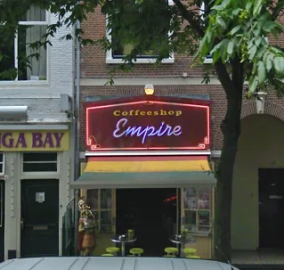 coffeeshop empire storefront with neon sign on urban street corner., coffeeshop empire, haarlem