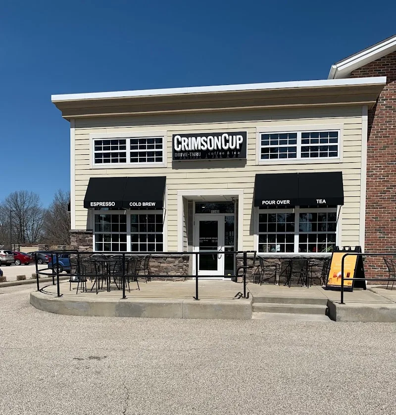 crimson cup drive-thru coffee shop with cream and black exterior storefront., crimson cup coffee shop - tallmadge, akron