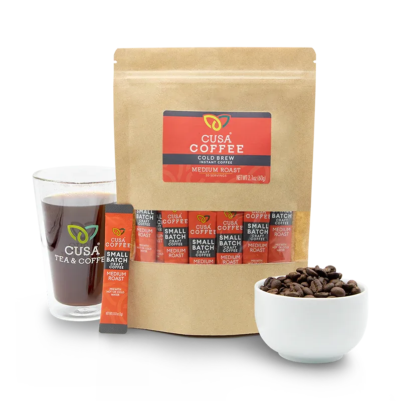 cusá coffee cold brew instant coffee package with cup, beans, and sachets displayed., cusa coffee and tea, loveland