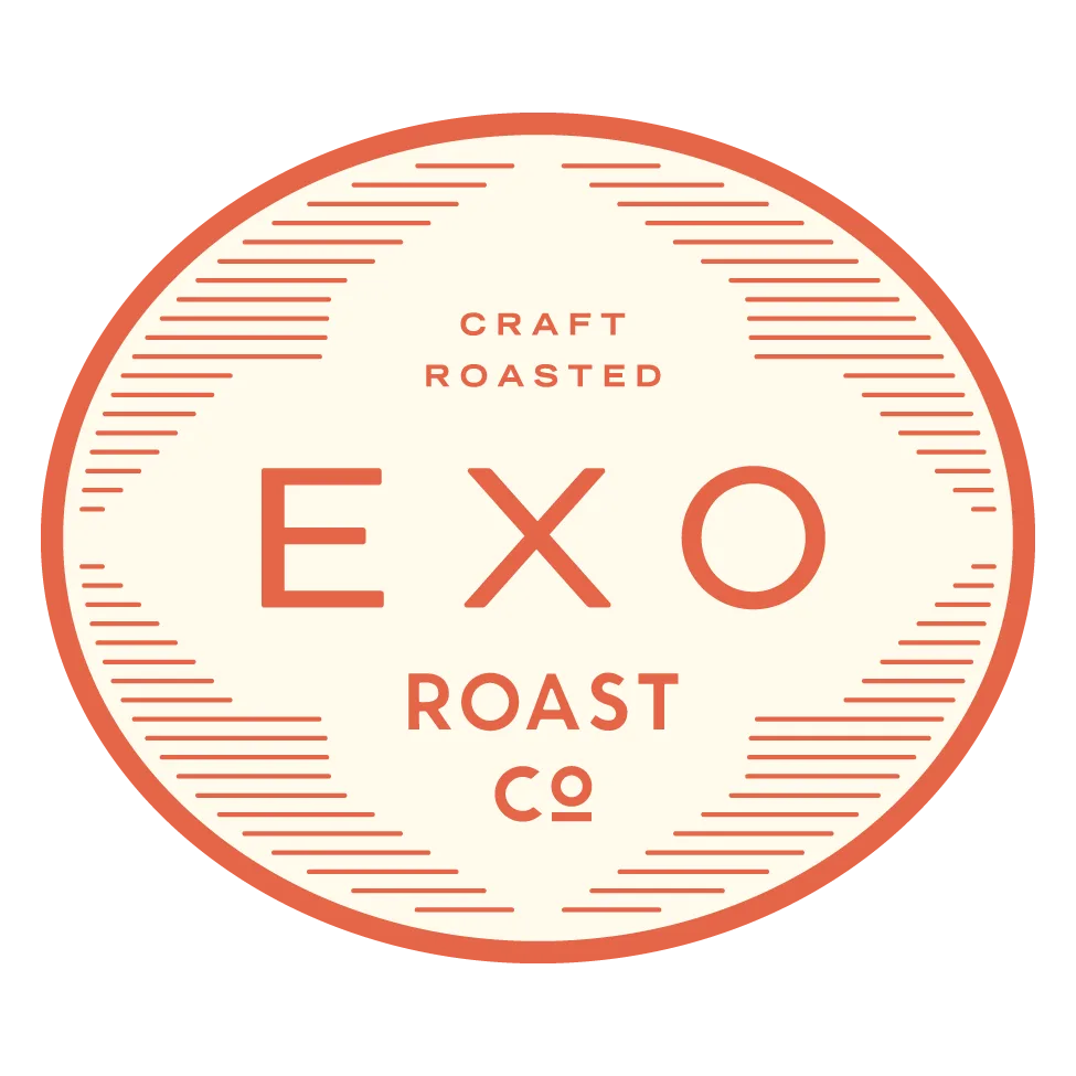 circular logo for exo roast co, craft roasted coffee company in red and cream., exo roast co, arizona