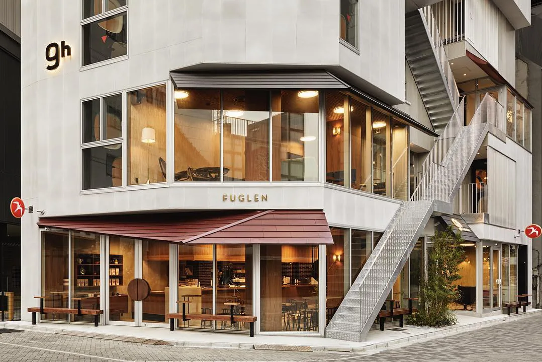modern street-level restaurant with warm wood interior, burgundy awning, glass frontage., fuglen coffee roasters, tokyo