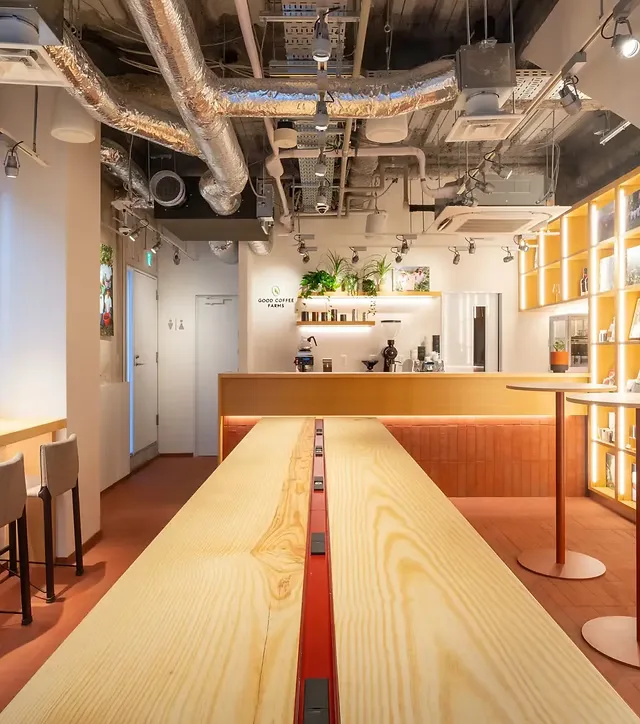 modern bowling alley with wooden lanes, counter service, and industrial ceiling details., good coffee farms cafe & bar, tokyo