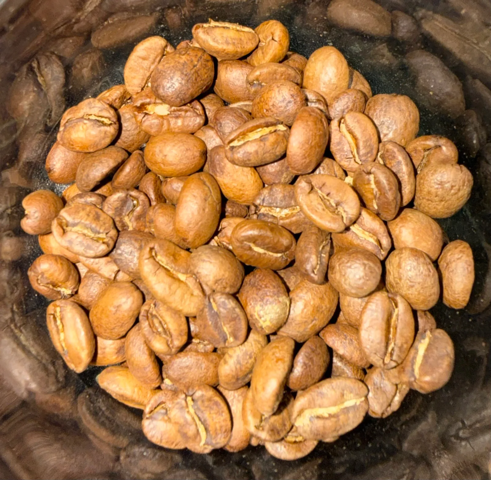 roasted cashews in a dark bowl, various shades of brown., inugami coffee, phoenix