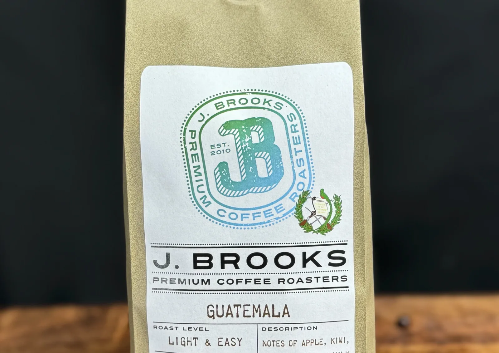 j. brooks premium coffee bag with circular logo and guatemala origin label visible., j brooks coffee roasters, tennessee