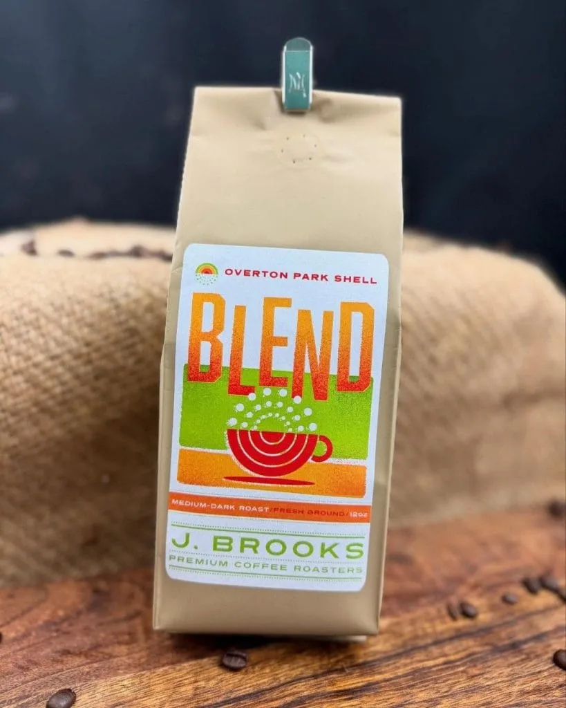 overton park shell blend coffee bag by j. brooks premium coffee roasters displayed with clothespin., j brooks coffee roasters