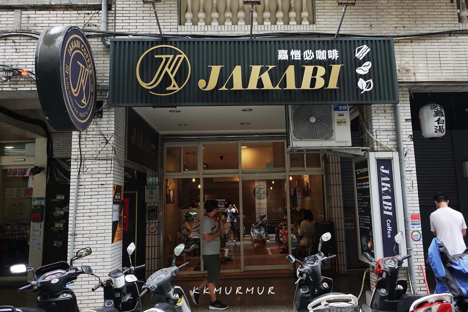 jakabi coffee shop storefront with motorcycles parked outside, brick facade., jakabi coffee 嘉愷必咖啡, taipei