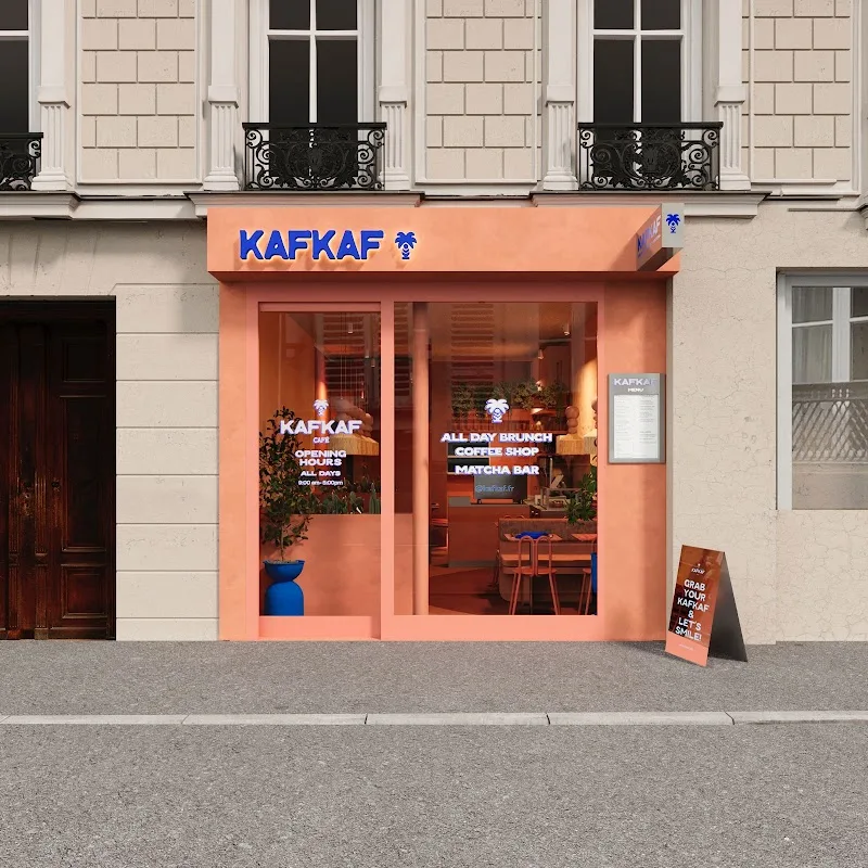 vibrant orange café storefront with blue signage and matching interior accents., kafkaf, paris