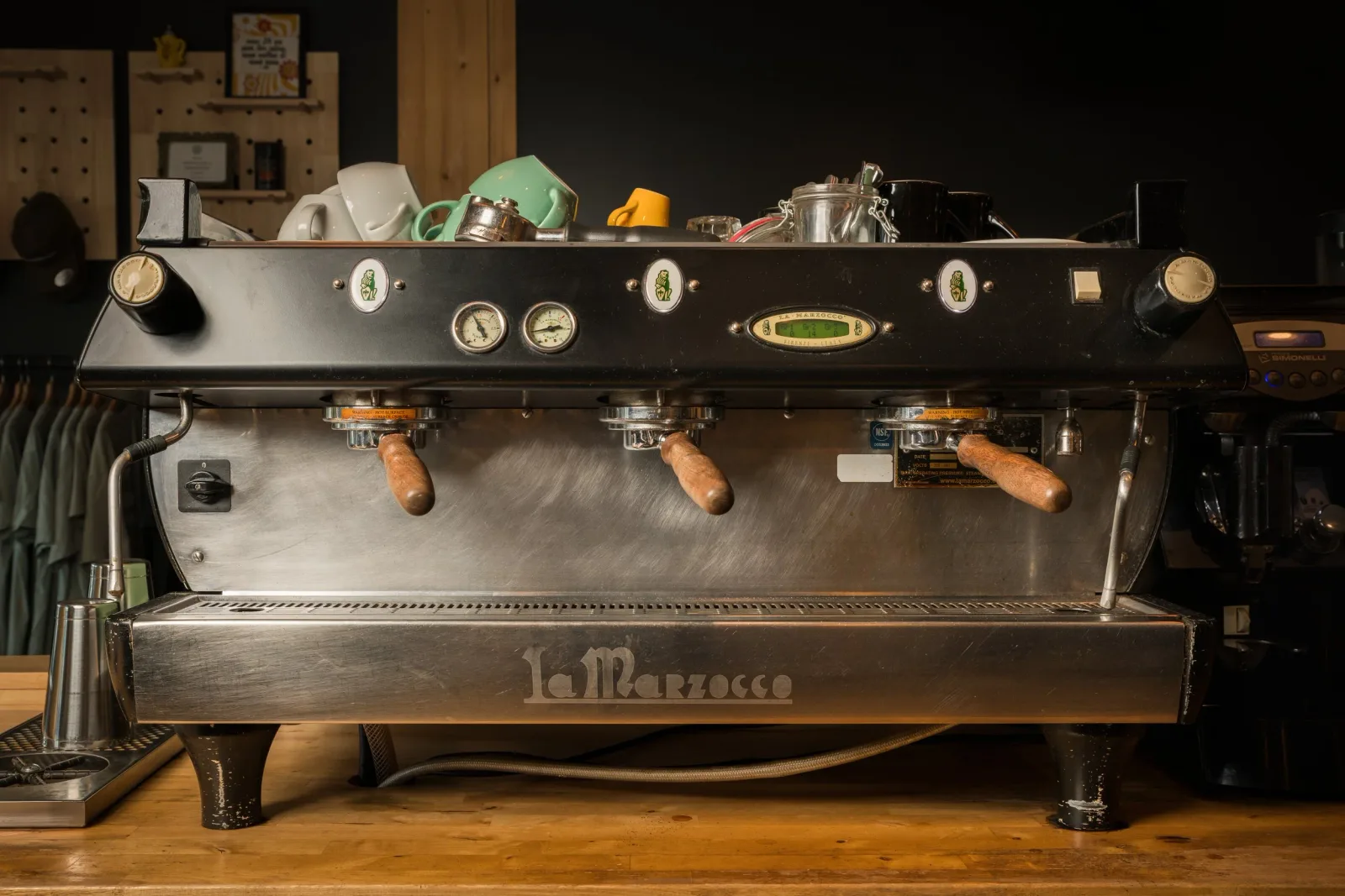 professional la marzocco espresso machine with three group heads and wooden handles., leyden street coffee equipment service 