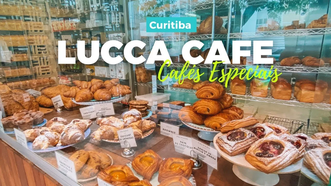 lucca cafe bakery display window in curitiba showcasing pastries and cakes., lucca cafés especiais, curitiba