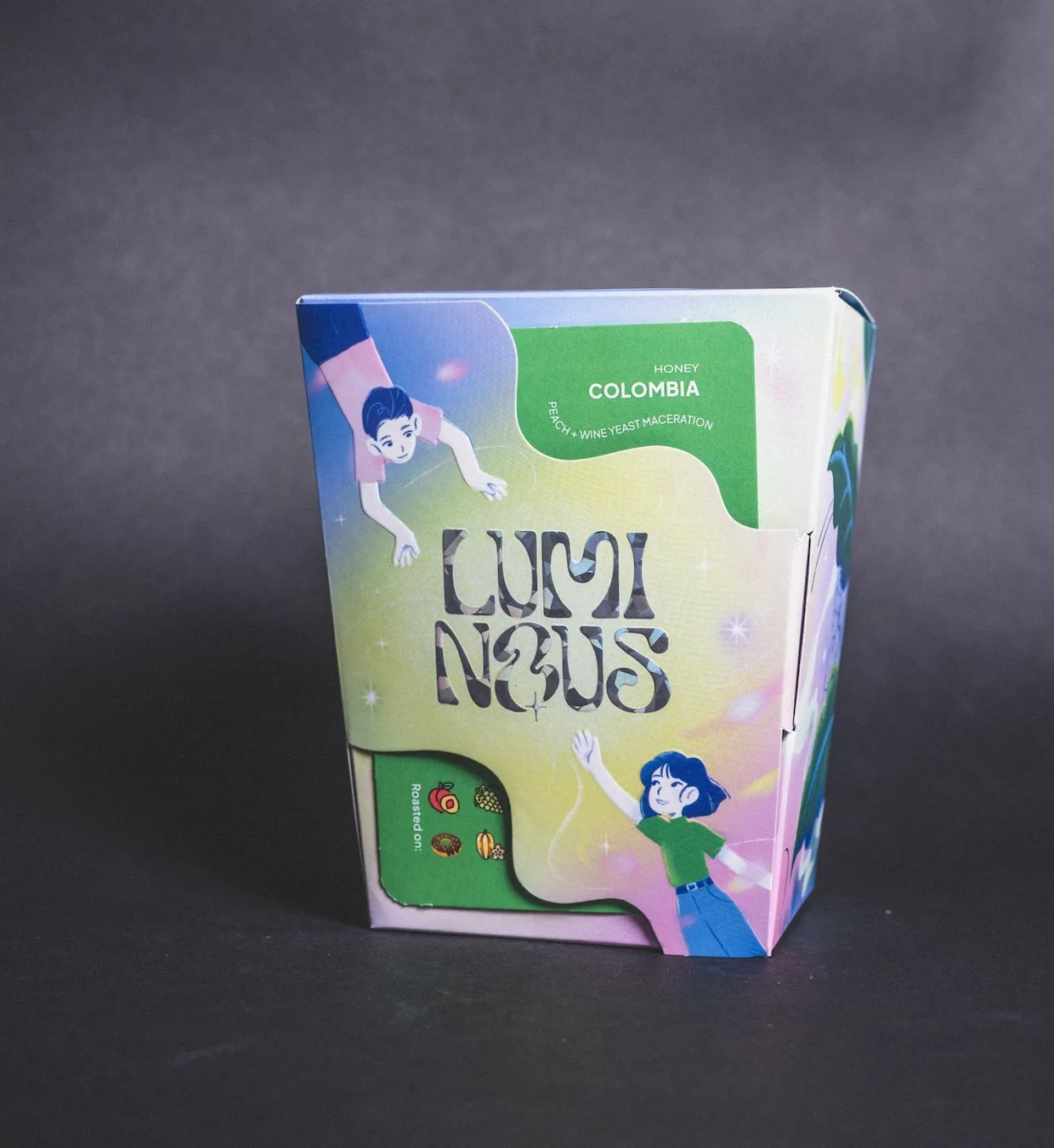 colorful fungi nexus colombia honey coffee package with illustrated characters and gradient background., luminous coffee, las