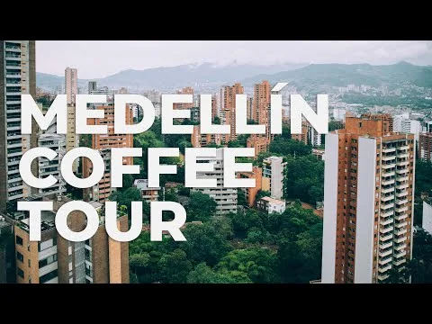 medellin cityscape with high-rise apartments, mountains, and lush green vegetation surrounding urban development., medallo co