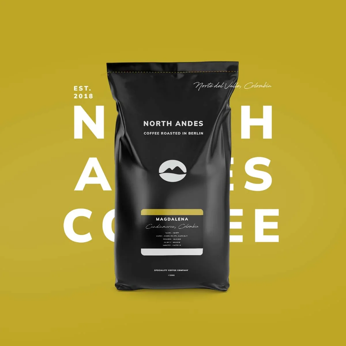 black coffee bag with gold accents centered on vibrant yellow background with white text., north andes coffee, berlin