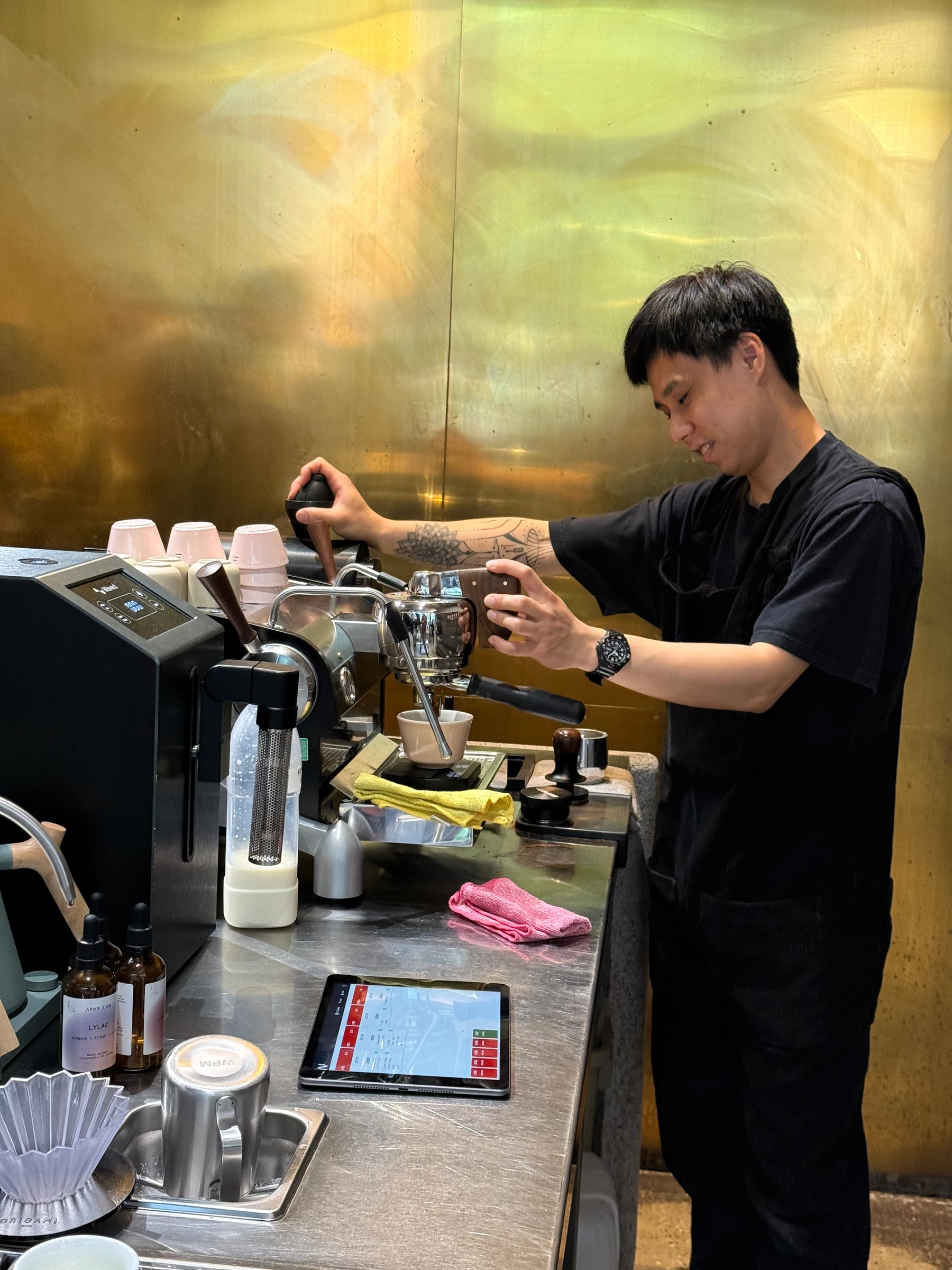 barista making the freeze distilled flat white