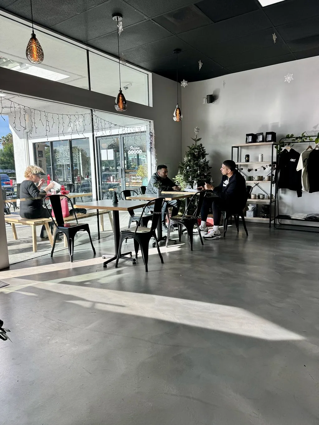 modern café interior with polished concrete floors and holiday decorations., offset coffee co., el segundo