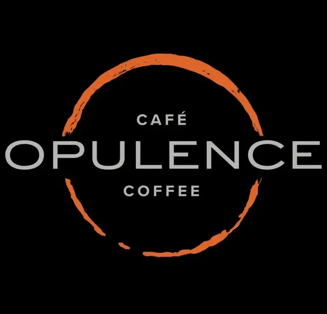 orange circular brush stroke frames "opulence café coffee" text on black background., opulence coffee, ottawa