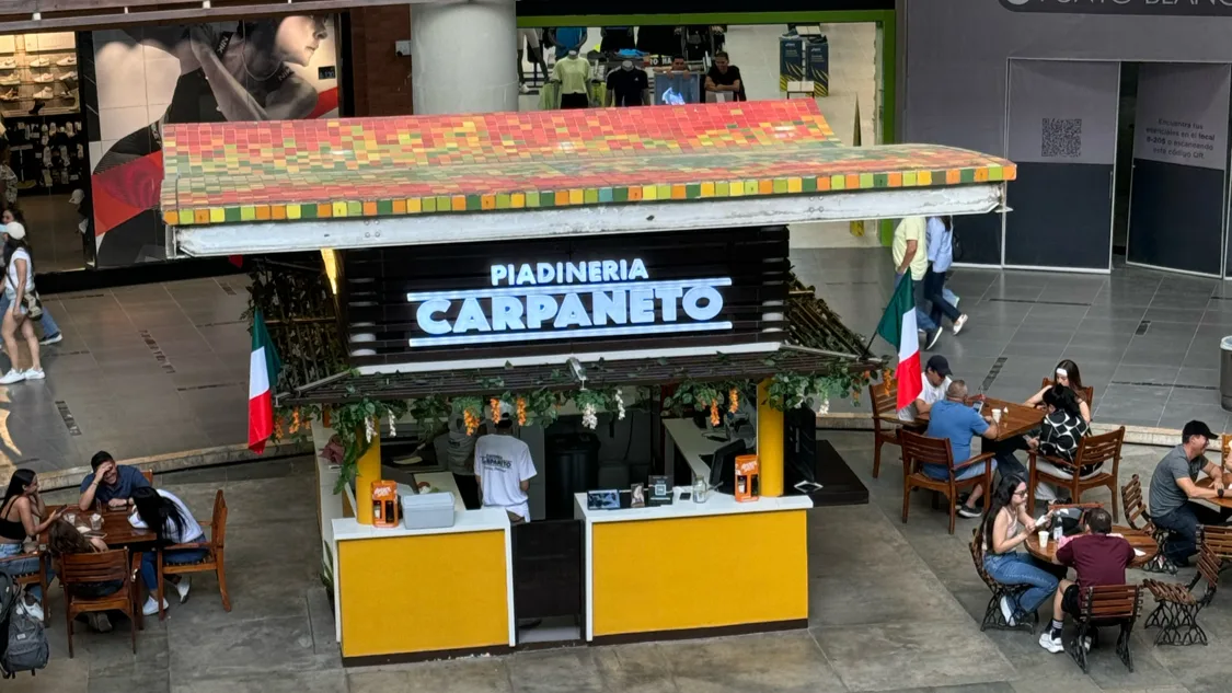 piadineria carpaneto food stall with colorful mosaic roof and dining area., oromo café librería, cali