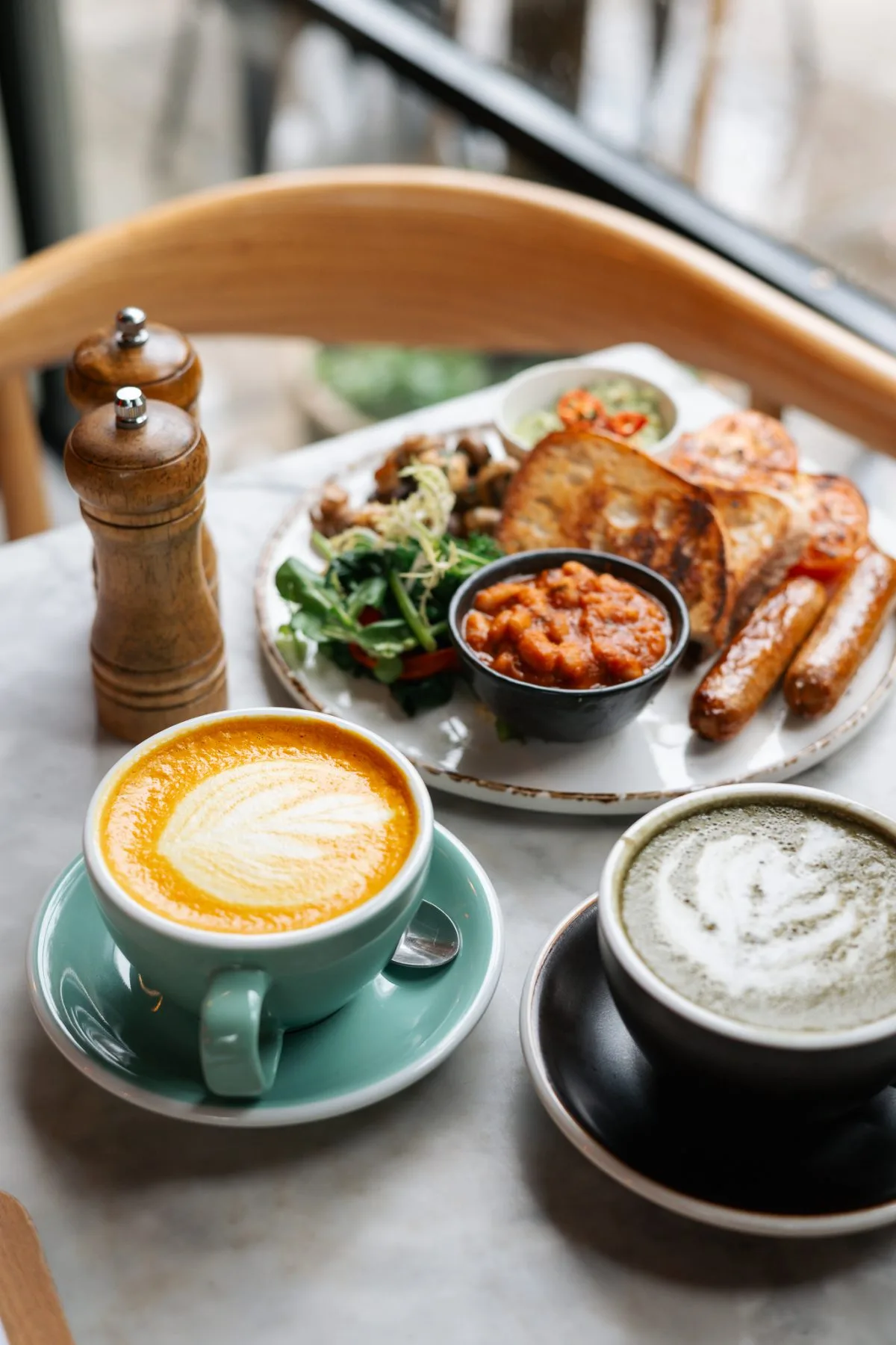 latte with latte art, sausages, vegetables, and dips on marble table., passione, kobe