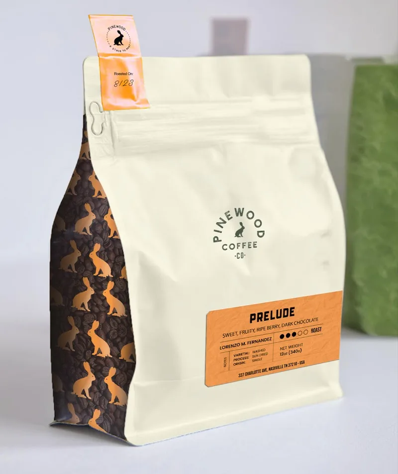 pinewood coffee co. bag featuring "prelude" blend with dog silhouette pattern design., pinewood coffee co., franklin