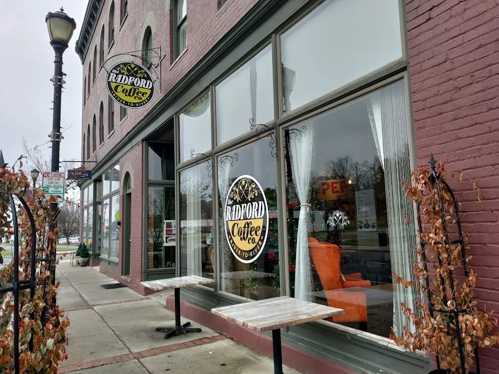 radford coffee co. storefront with large windows and autumn vine decorations., radford coffee company, blacksburg