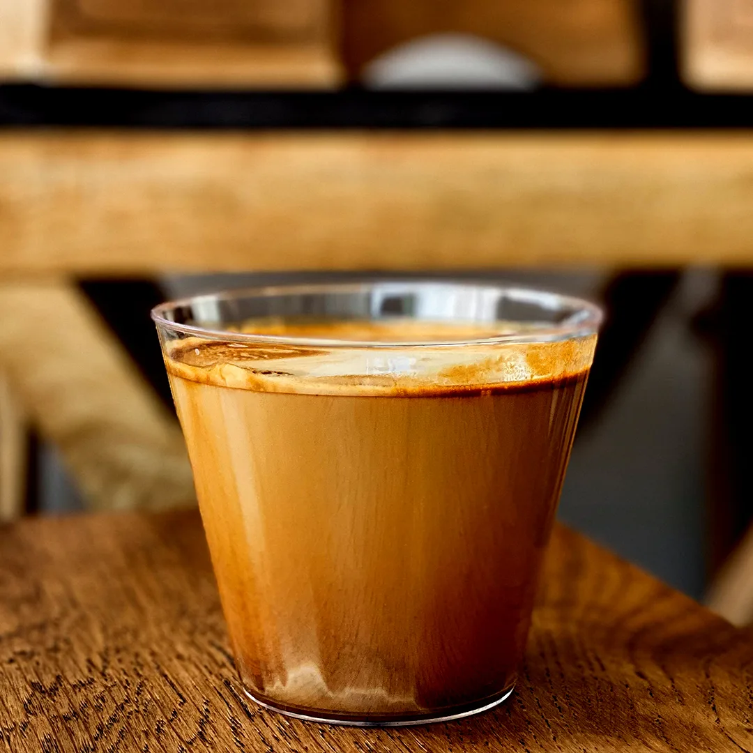 modern coffee shop interior with baristas serving customers at counter., regent coffee roasters and brew bar, los angeles