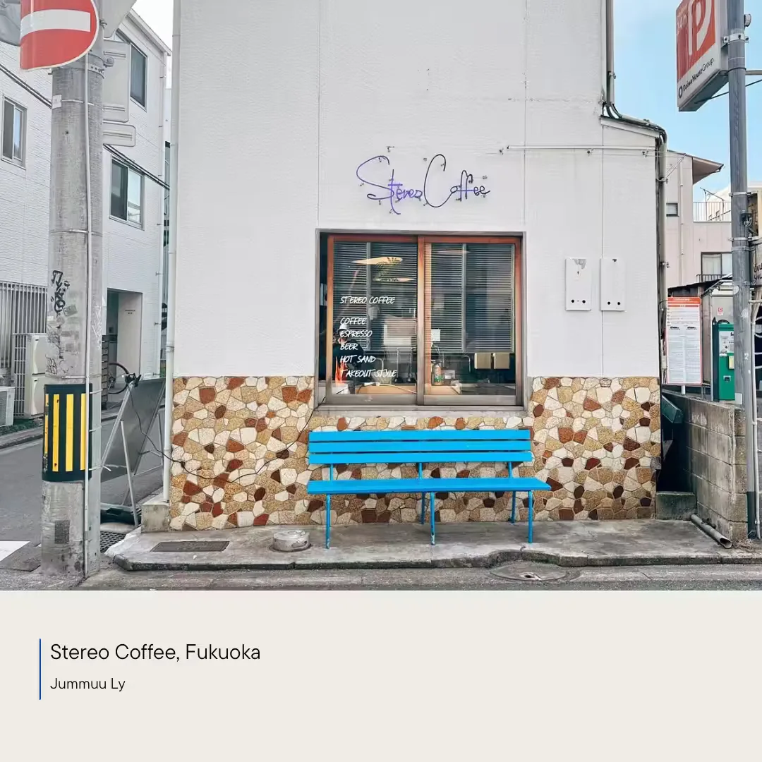 blue bench outside stereo coffee storefront with stone facade in fukuoka., stereo coffee, fukuoka