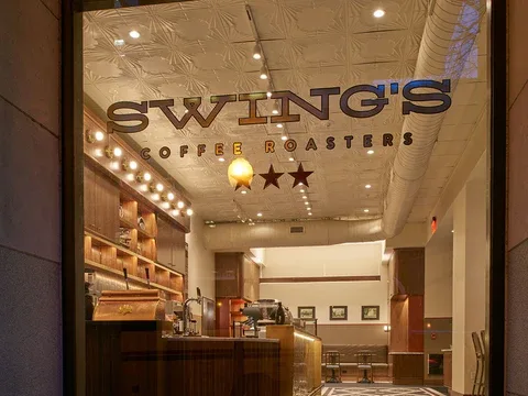 swing's coffee roasters storefront with counter, shelving, and warm interior lighting., swing's coffee, washington