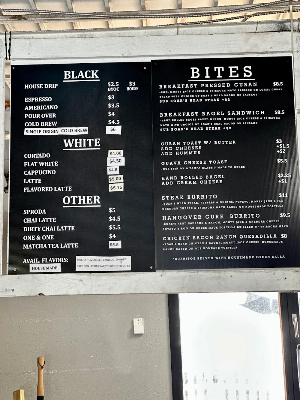 black coffee shop menu board displaying beverages and cuban breakfast sandwiches., the lab coffee - west tampa, tampa