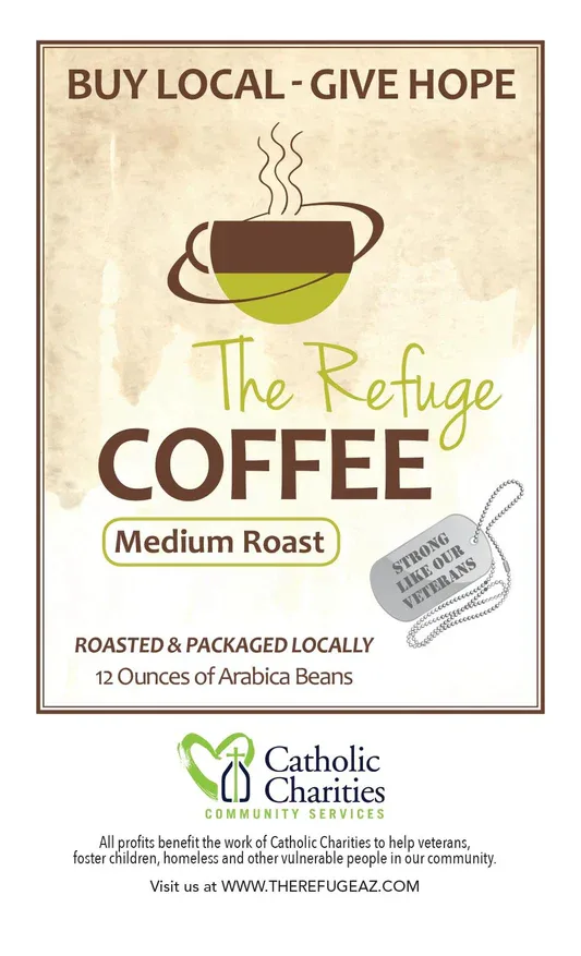 medium roast coffee package label with steaming cup design and catholic charities branding., the refuge coffee, phoenix