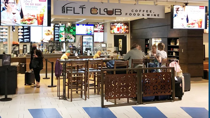 flt club coffee shop with customers, counter seating, and menu displays., the refuge coffee, phoenix